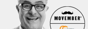older man with moustache smiling
