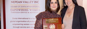 Global Skills Managing Director Rebecca and award winner standing in front of Zonta banner
