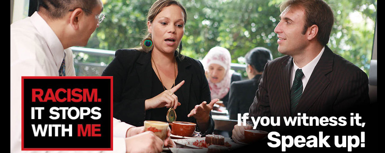 woman explaining something to 2 other people sitting at her table