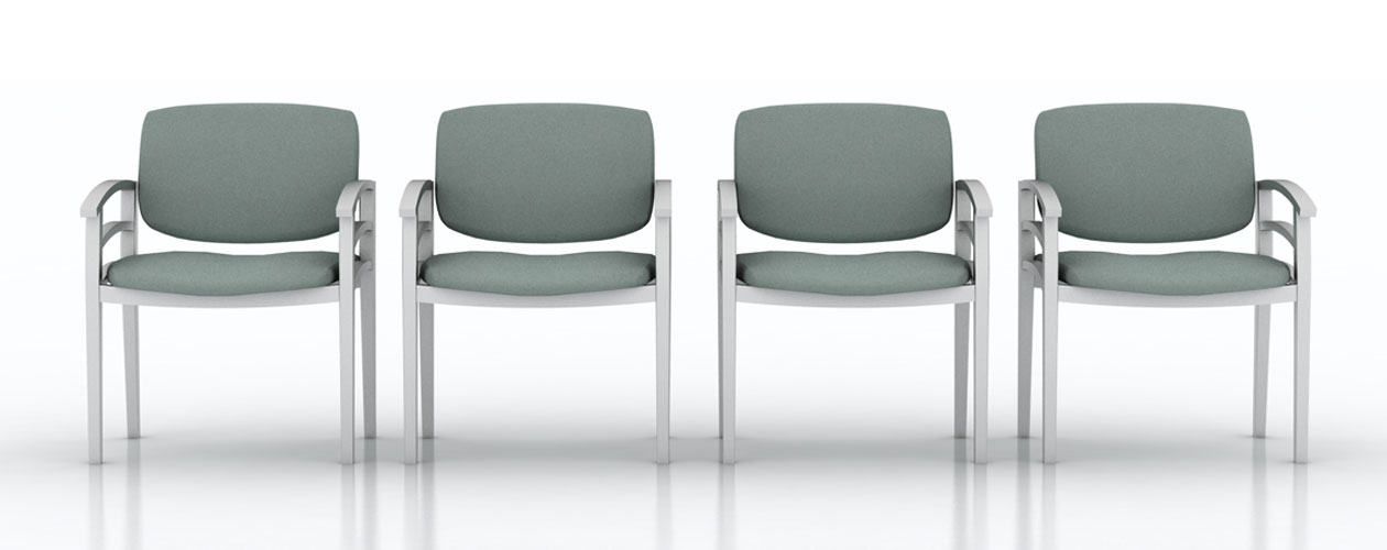 4 grey empty chairs in a row