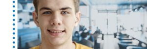 young man wearing hearing aids