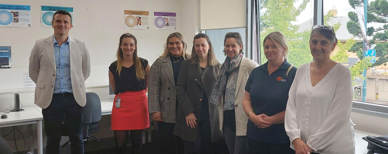 program partners standing in Global Skills office