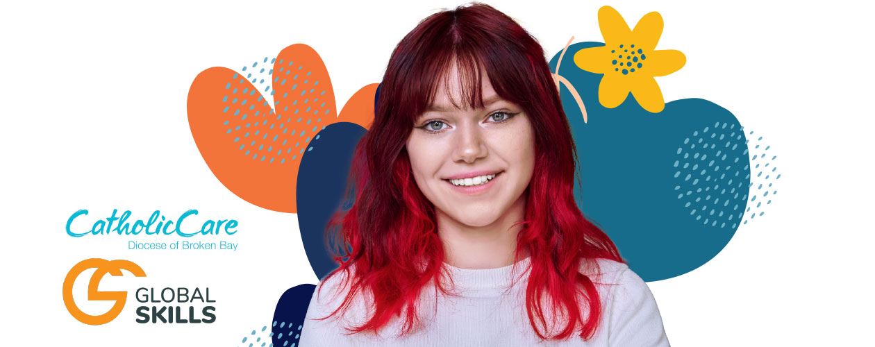 Young woman with red hair standing in front of vector flower graphic