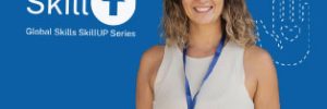 woman with volunteer tag on lanyard around her neck