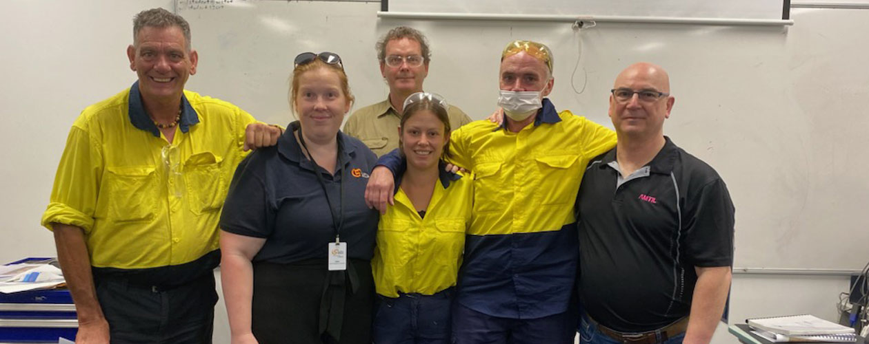 graduates with trainer and global skills staff