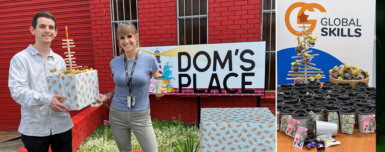 global skills staff member hands gift to dom's house staff member