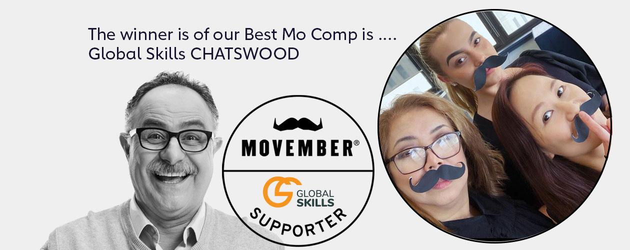 3 staff wearing black paper moustaches, middle aged man with real moustache and Movember logo