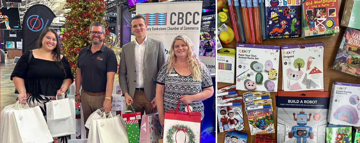 group including global skills staff holding gift bags