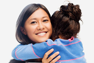 mother hugging child