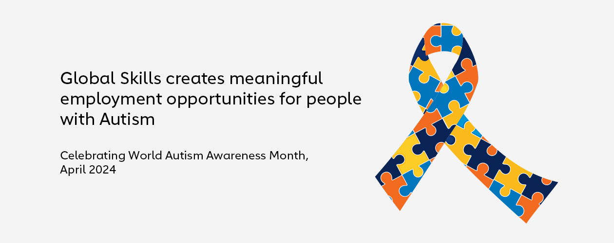Autism ribbon made up of coloured jigsaw puzzle pieces