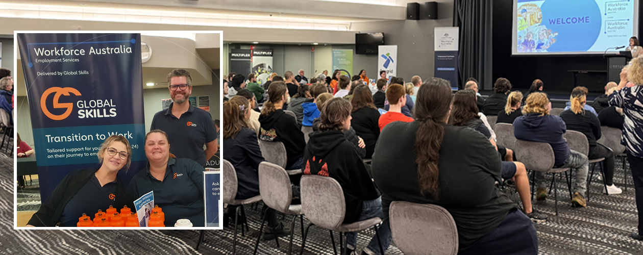 young people sitting on chairs listening to a presentation by an employer at the event