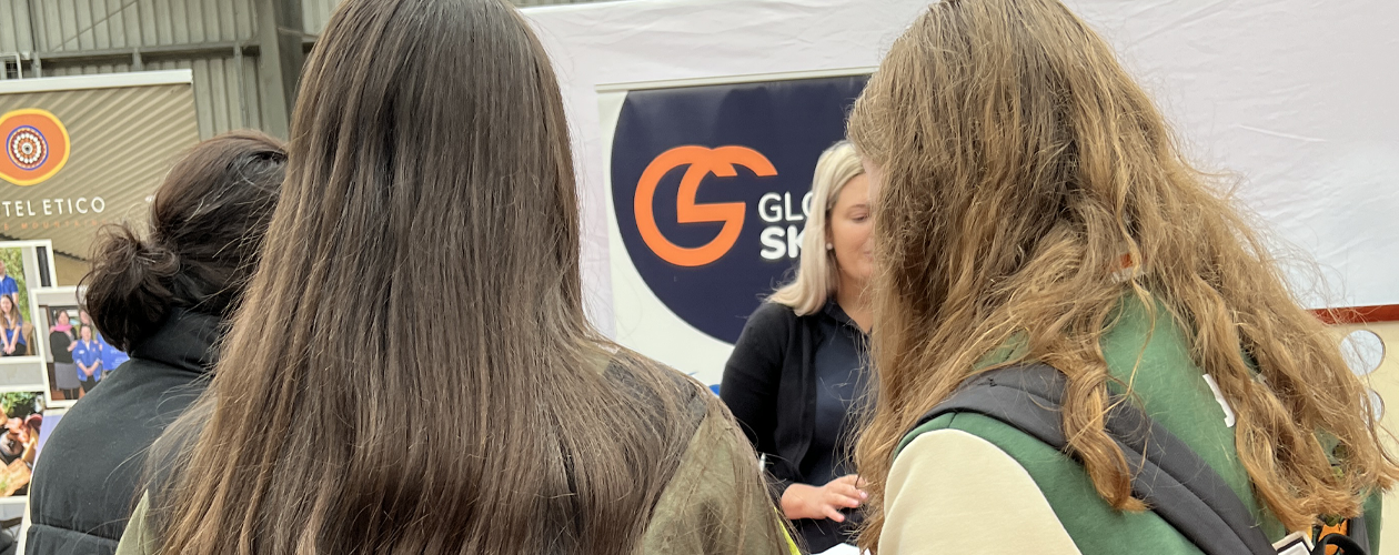 Victoria chatting to young people at our stall