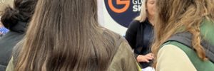 Victoria chatting to young people at our stall