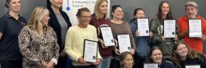 Participants with their certificates