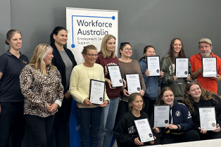 Participants with their certificates