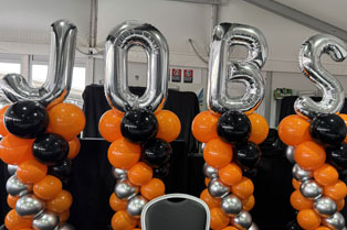 balloons that spell out the word 'JOBS'