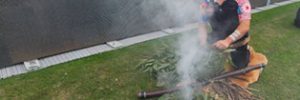 Eucalyptus leaves burning as part of the smoking ceremony performed on the day