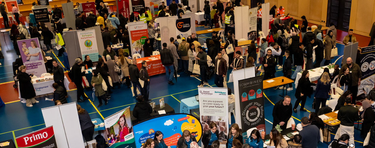 Overhead view of the event including Global Skills banner