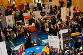 Overhead view of the event including Global Skills banner