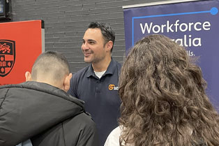 Robert engaging with attendees at the event