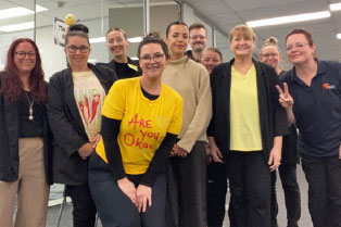 Our Gosford team wearing yellow