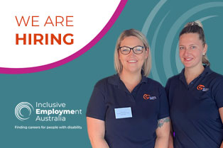 2 staff members in logo shirts under the words 'we are hiring'