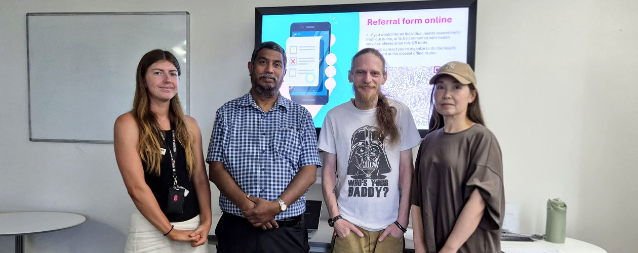 Maddy and Devan from Mission Australia along with Global Skills participants John and Qian.