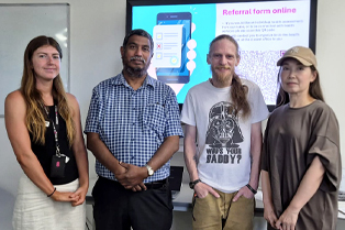 Maddy and Devan from Mission Australia along with Global Skills participants John and Qian.