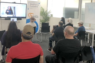 Participants watch the ‘Can You Spot a Scam?’ webinar during our Get Online Week event at Liverpool.